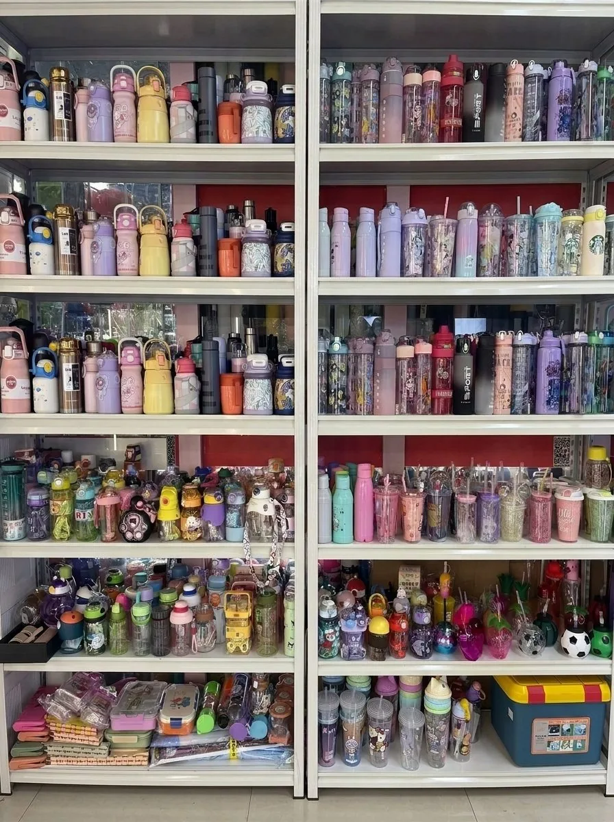H2deek drinkware showroom wall display — hundreds of tumbler and bottle SKUs